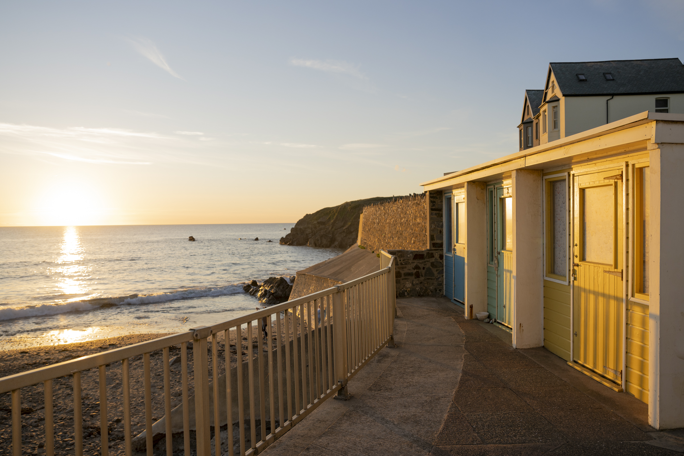 Beach huts by the sea at Crooklets beach 
