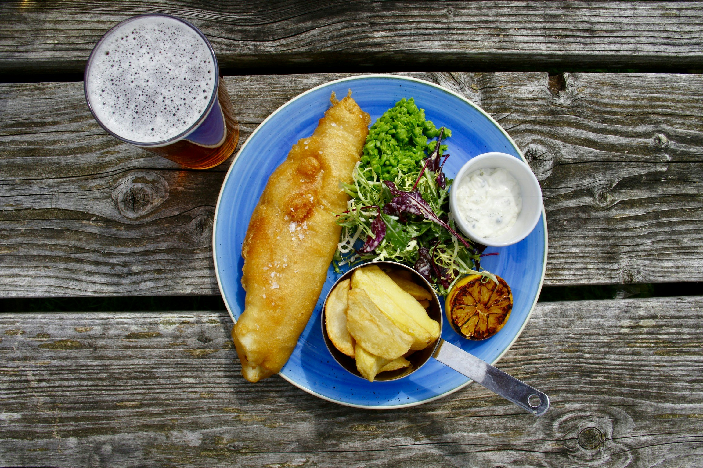 Fish and chips with a beer 